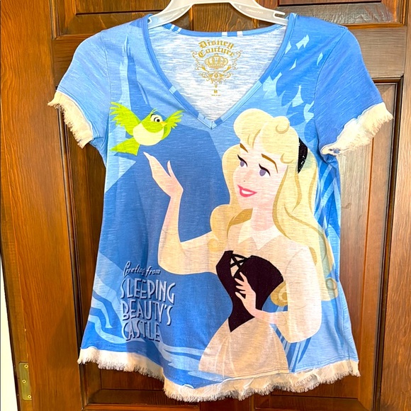 Disney Couture M Greetings from Sleeping Beauty’s castle v-neck with fringe hems - Picture 1 of 11